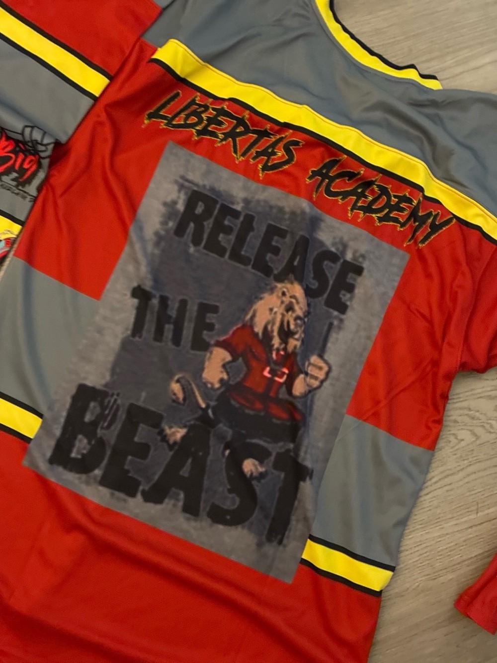 'Release the Beast' Red & yellow hockey jersey